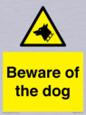 beware-of-the-dog-with-dog-warning-symbol~